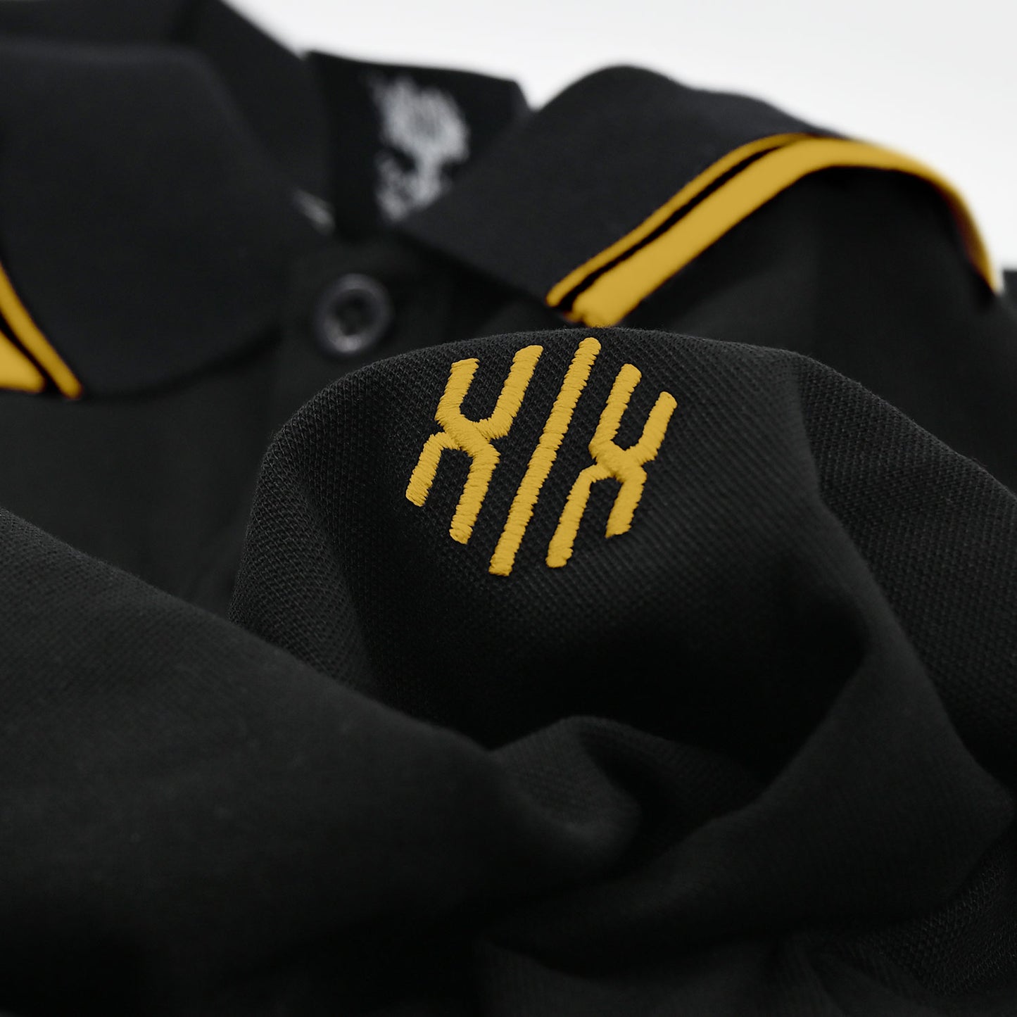 Poloshirt »Invictodrom« Black/Gold Premium Kollektion