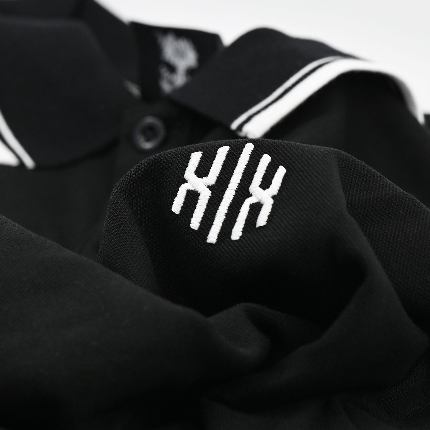 Poloshirt »Invictodrom« Black/White Premium Kollektion